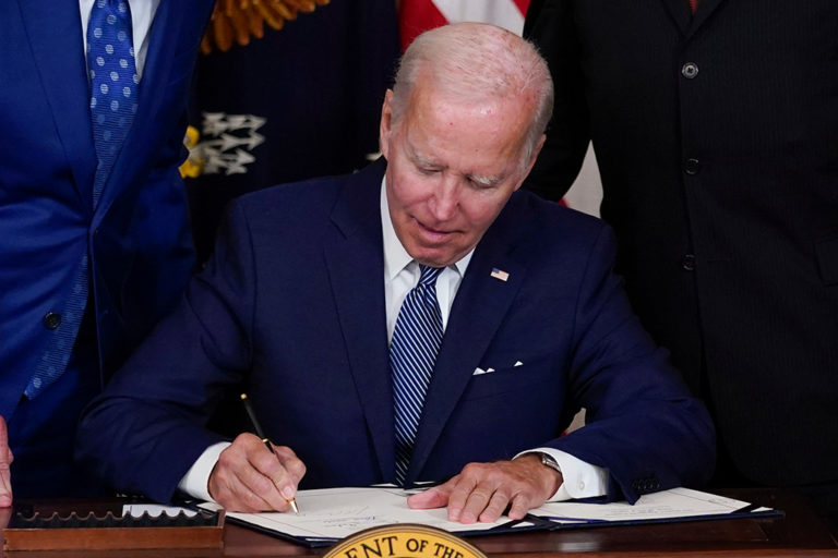 Biden signs $740B Inflation Reduction Act into law
